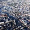 A photograph of Bristol city centre taken from the sky with the harbour to the lft of the image and the city centre buildings to the right
