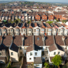 Aerial view across Bristol looking across streets and the roftops of houses
