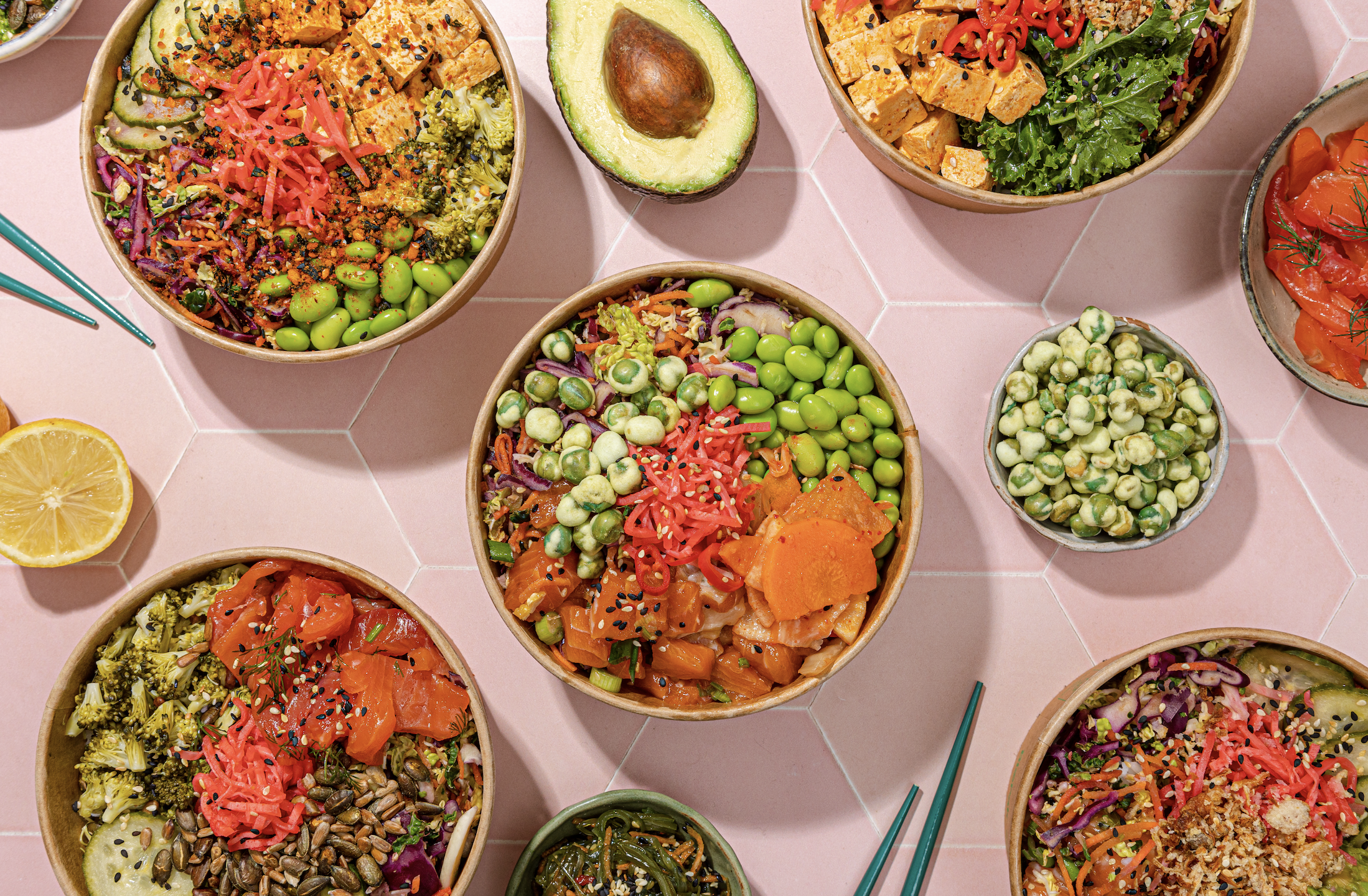 Poke bowls full of tofu, fish and colourful vegetables 