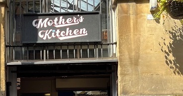 A sign saying Mother's Kitchen